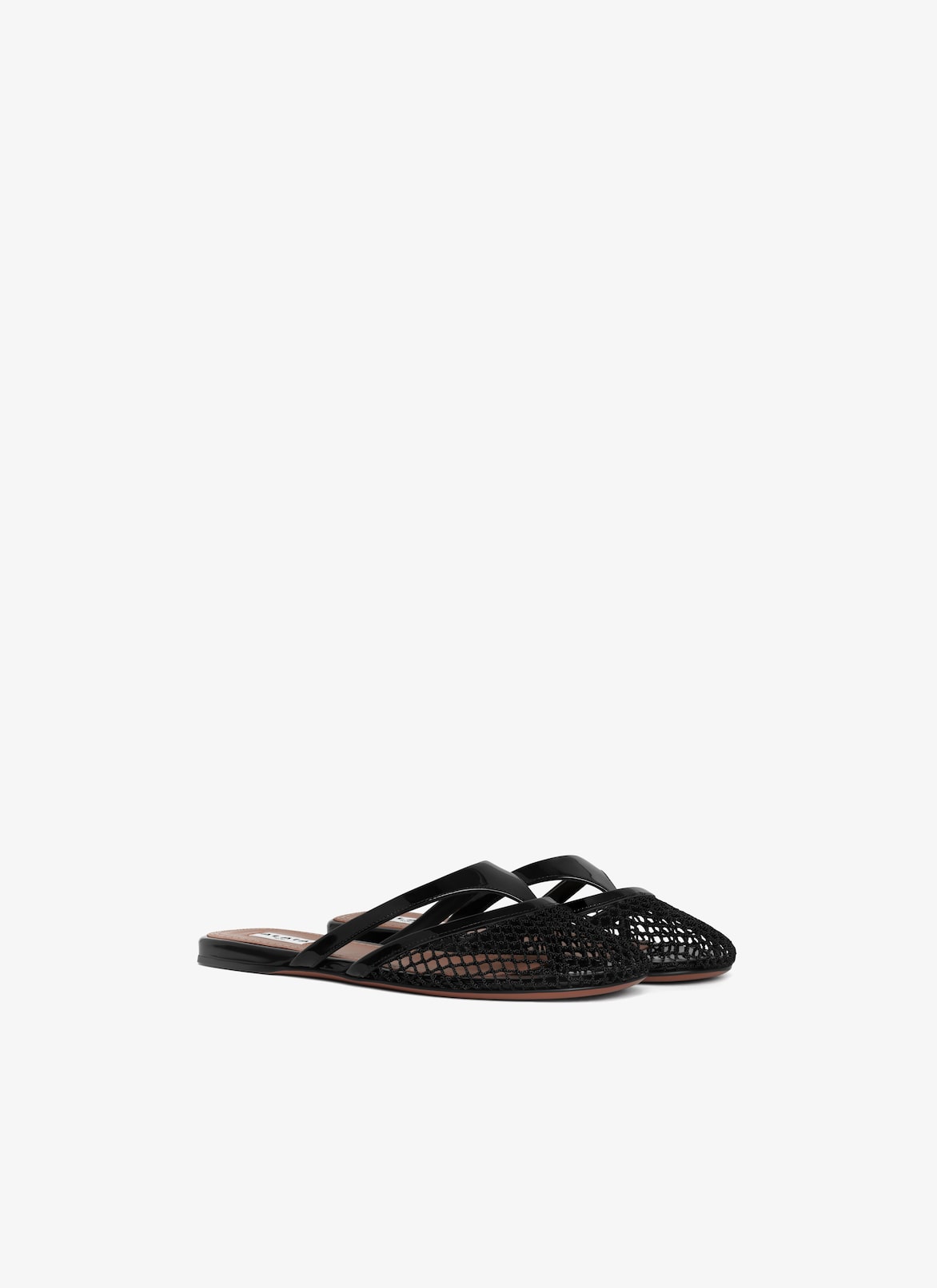 INFRADITO FLAT MULES IN FISHNET AND LEATHER ALAÏA BLACK INFRADITO FLAT MULES IN FISHNET AND LEATHER